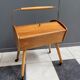 Sewing box on legs and wheels