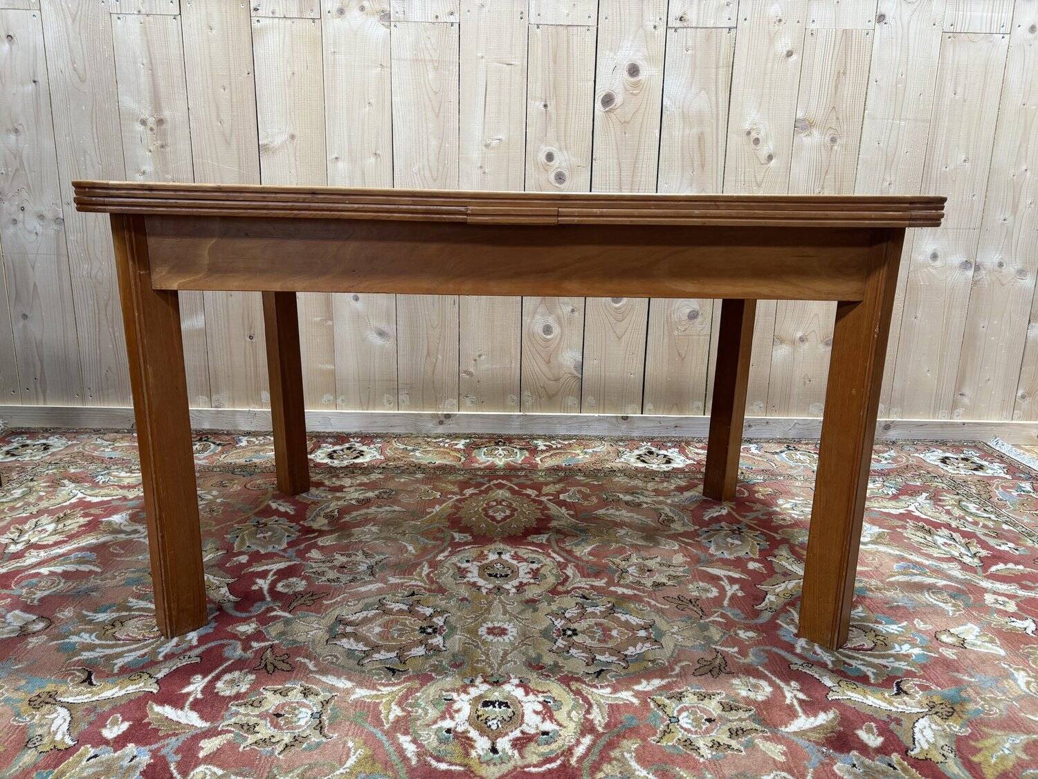 Table with extensions from the 1950s in elm.