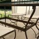Table de terrasse plateau en verre + 6 chaises en fer forgé