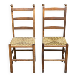 2 solid wood and straw chairs