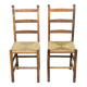 2 solid wood and straw chairs