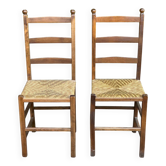 2 solid wood and straw chairs