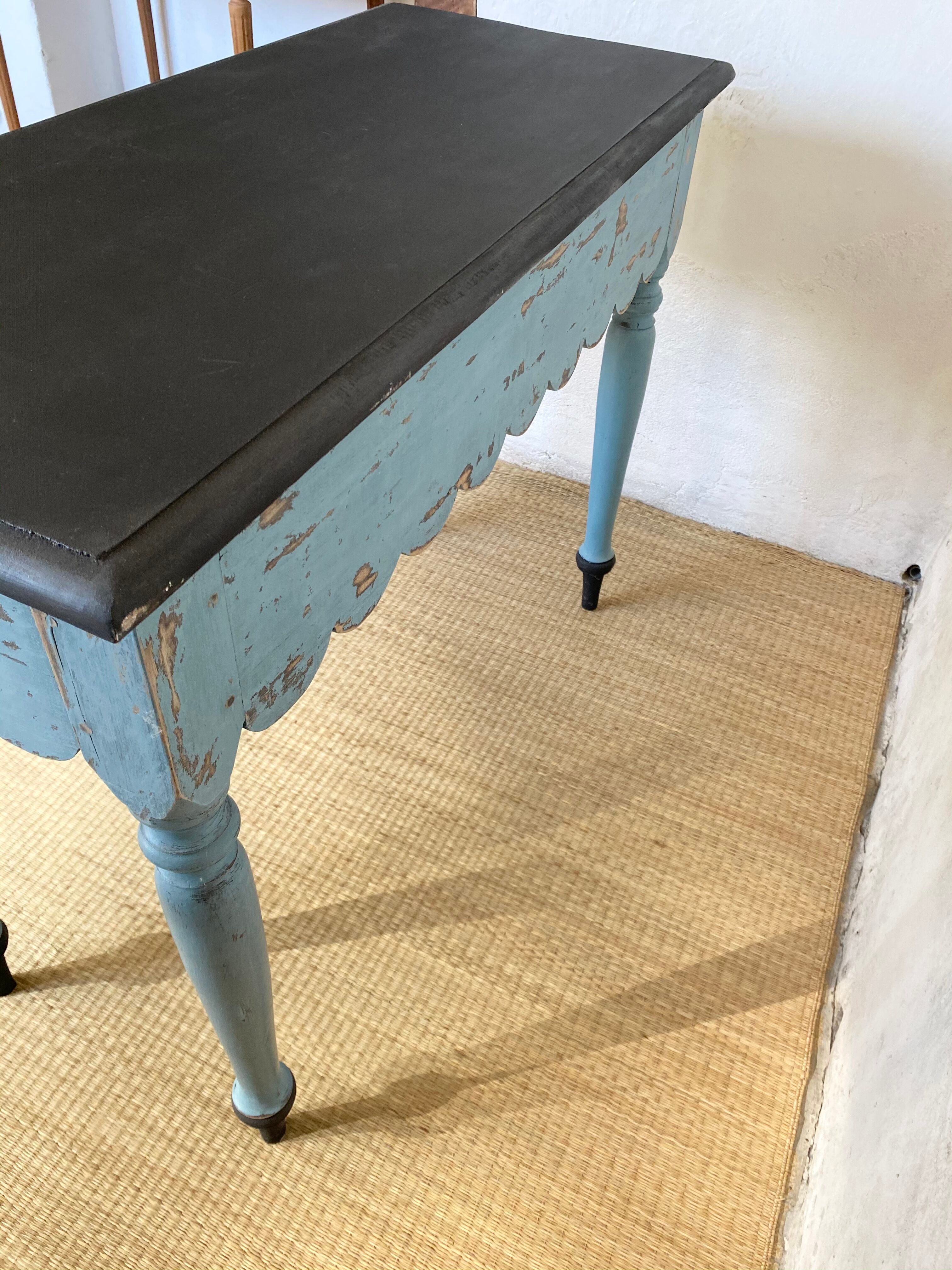 Scalloped console table