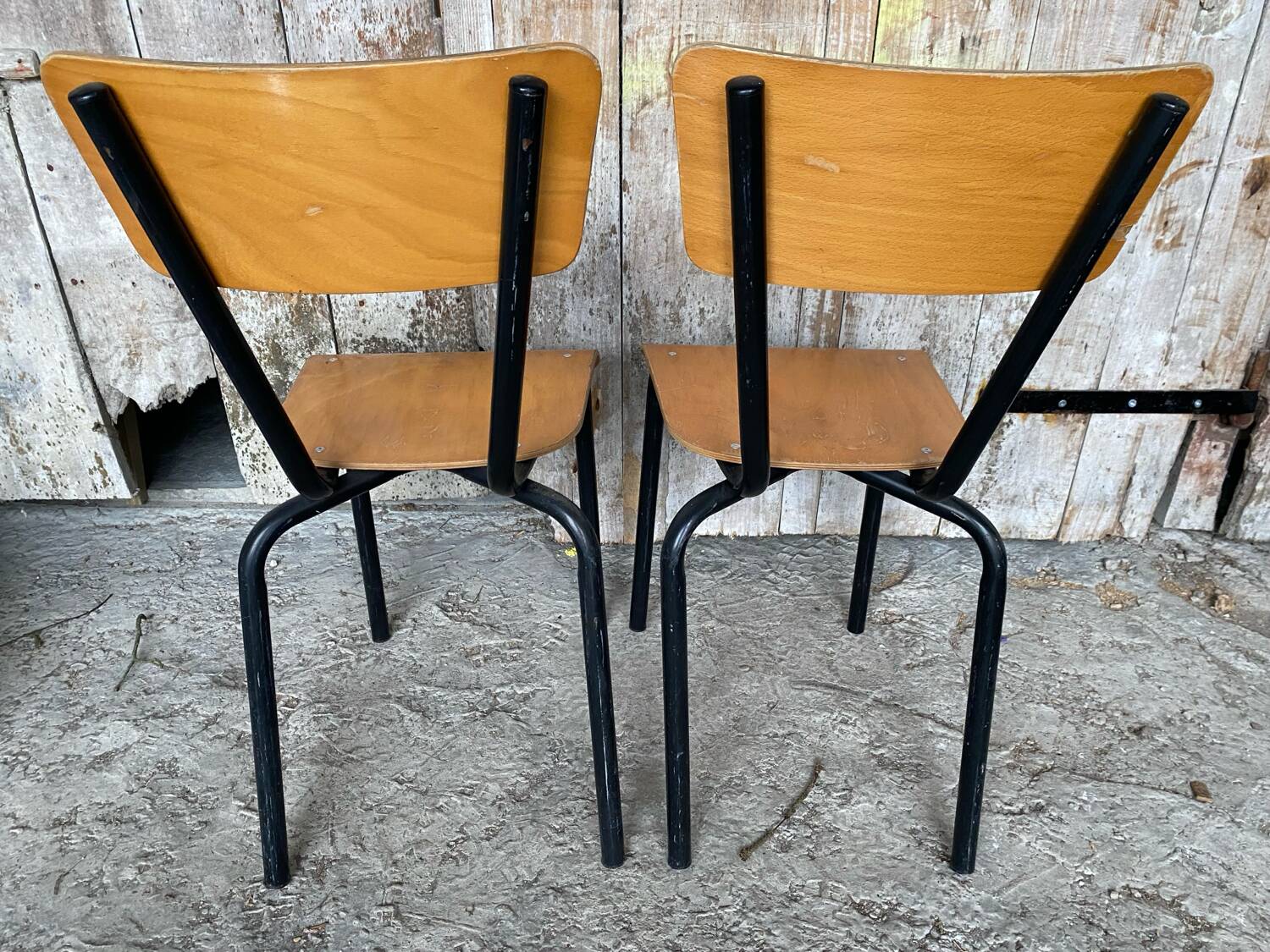Pair of antique chairs in black metal + wooden seat & back