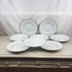 Hollow porcelain plates of pure white and gold