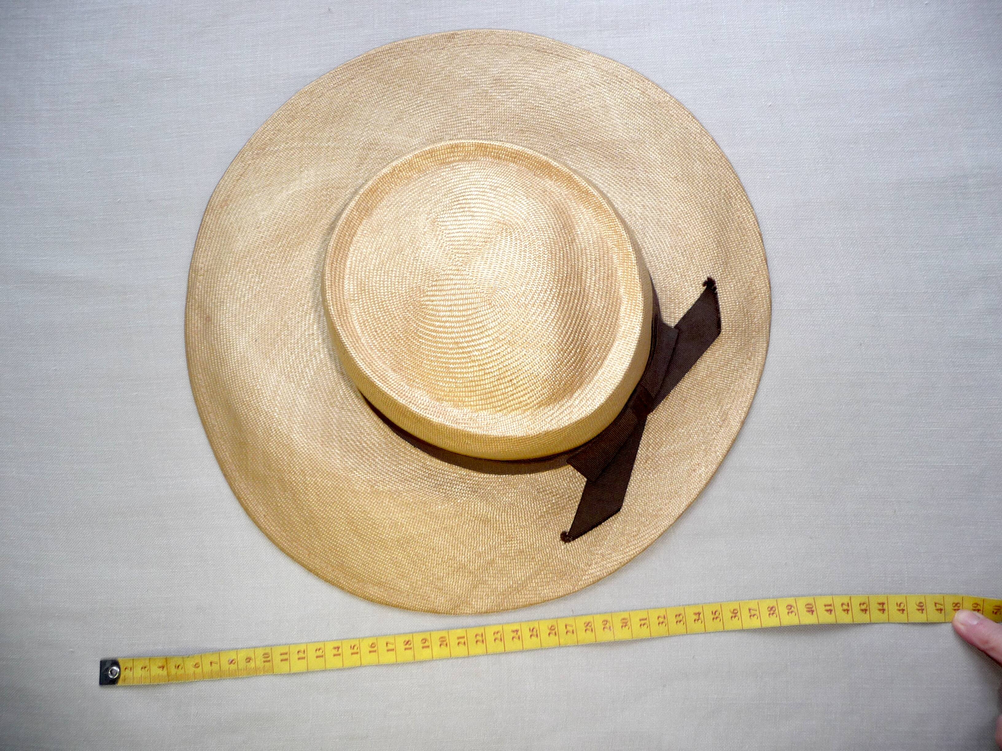 Handmade 50s boater hat in straw and brown ribbon