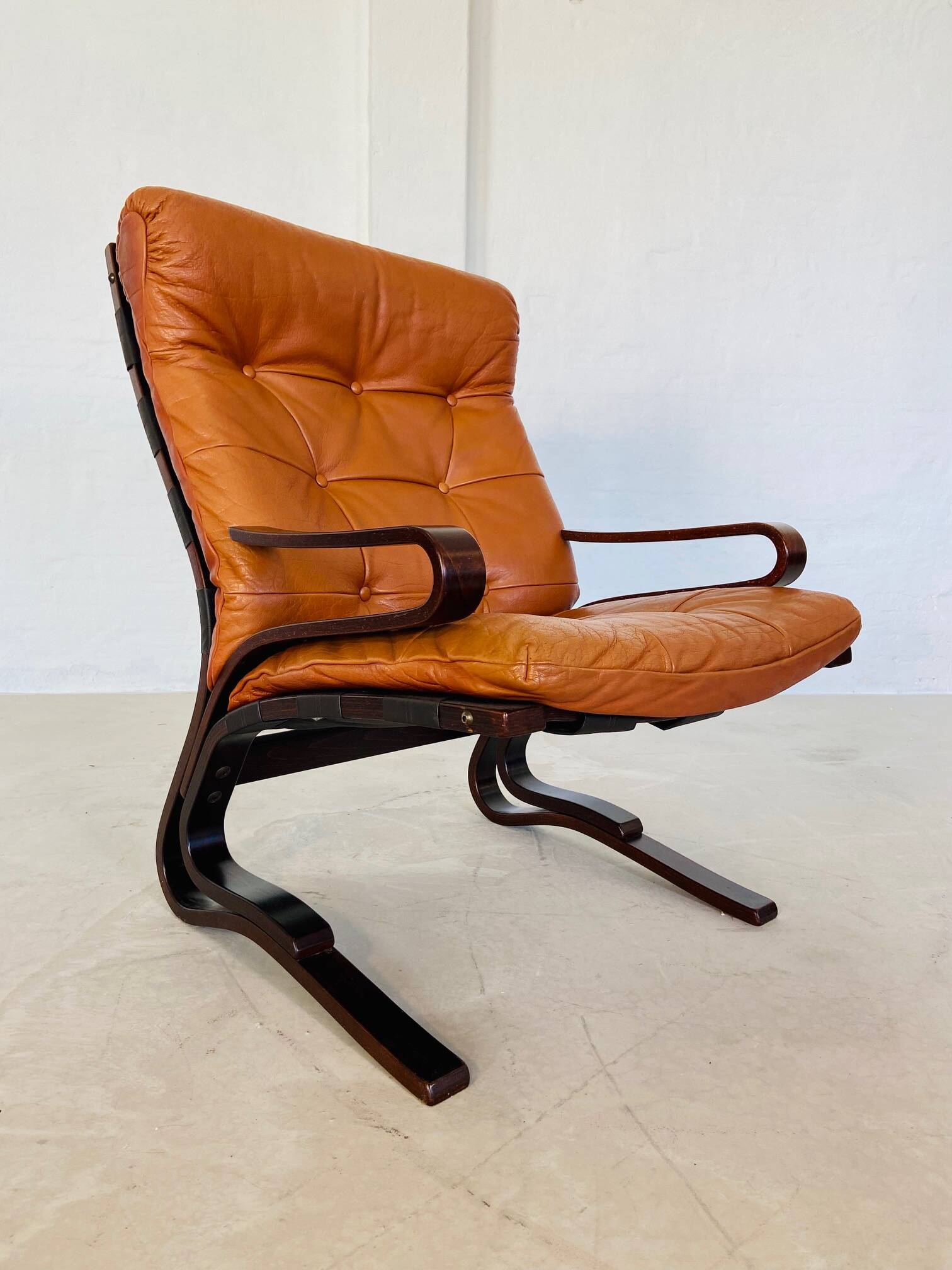 Vintage mid century scandinavian (oddvin rykken) cognac leather chair 1960s
