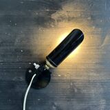 Old black metal and brass wall light, adjustable, 1930s.