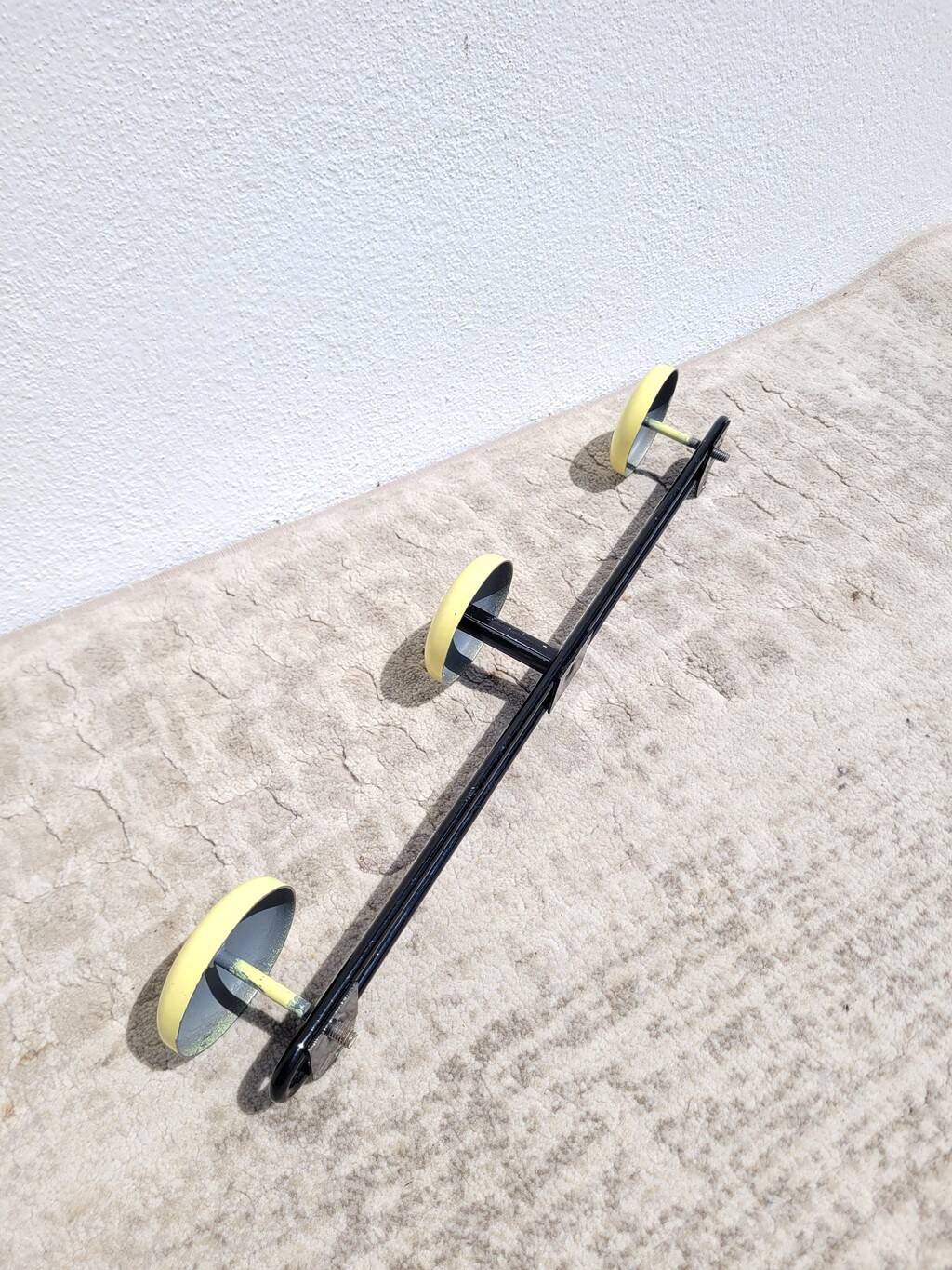 60s yellow wall coat rack