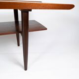 Table basse en teck avec tuiles bleues de design danois des années 1960.