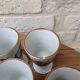 Old coffee service with 6 mazagrans and coffee pot with blue floral decoration