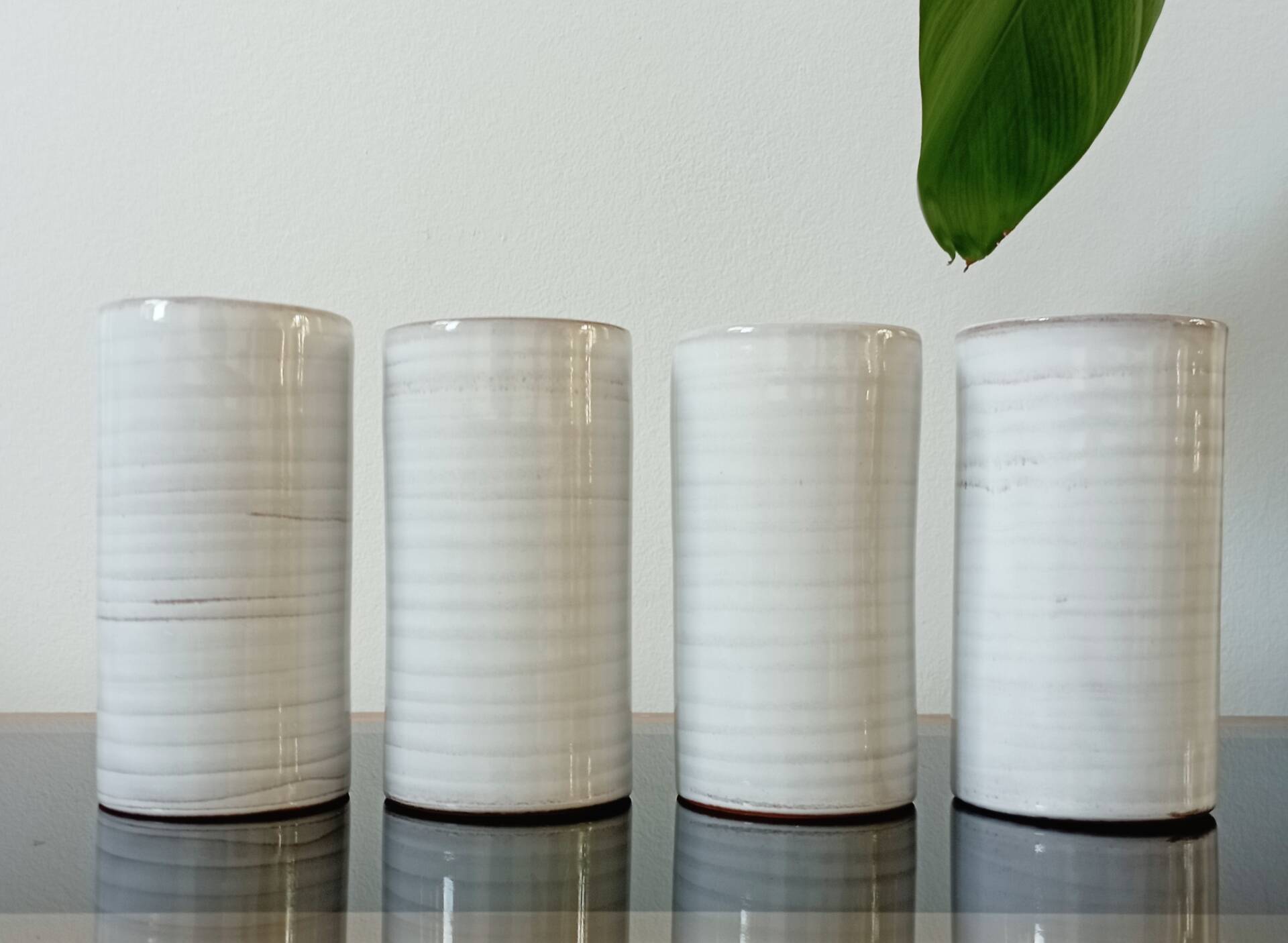 4 vintage stoneware cups in white