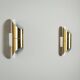 Pair of cylindrical wall lamps in brass with perforated shades
