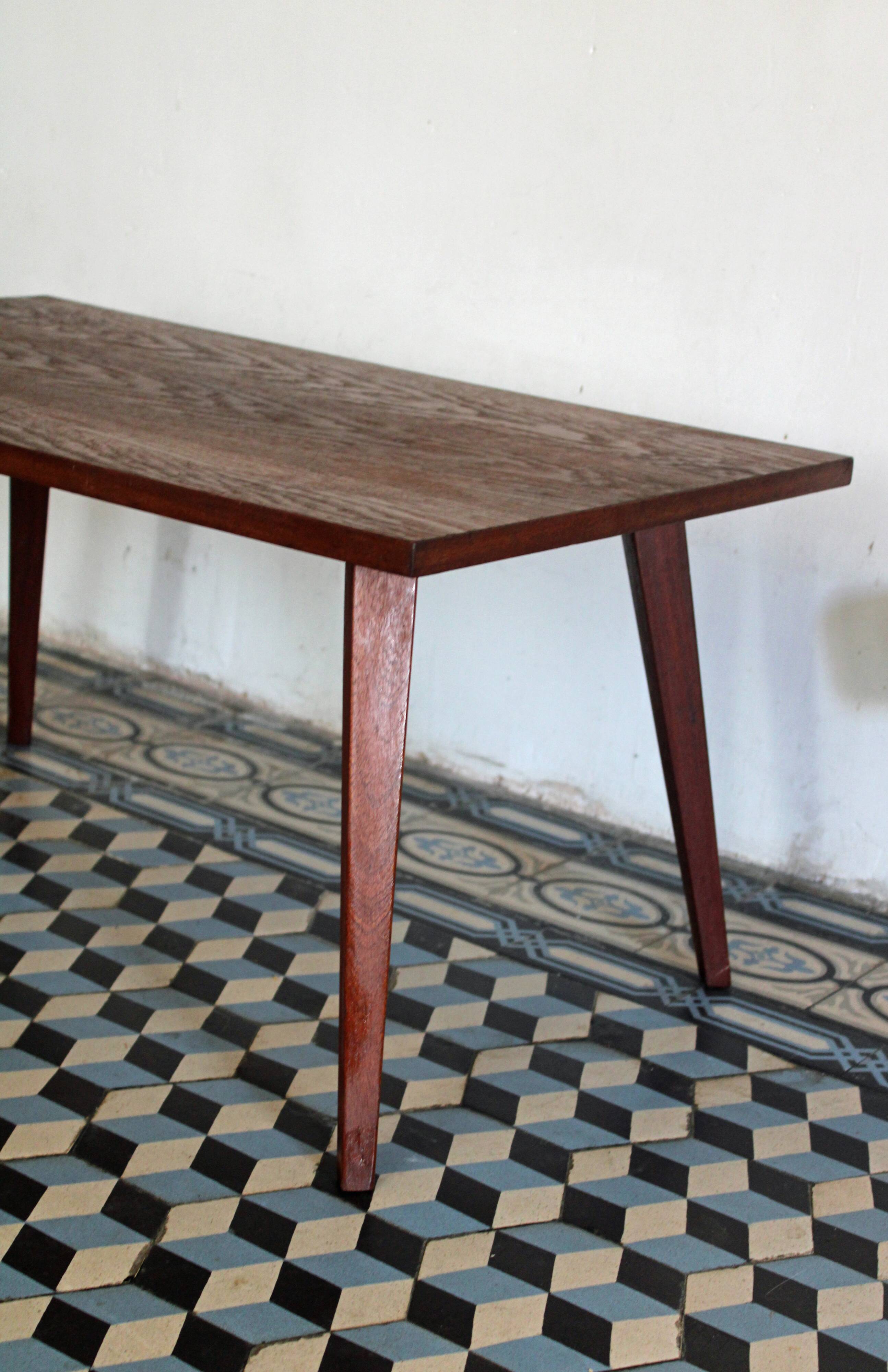 Teak coffee table with compass feet
