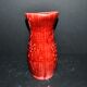 Sarreguemines wine jug in red slipware with grapevine decoration.