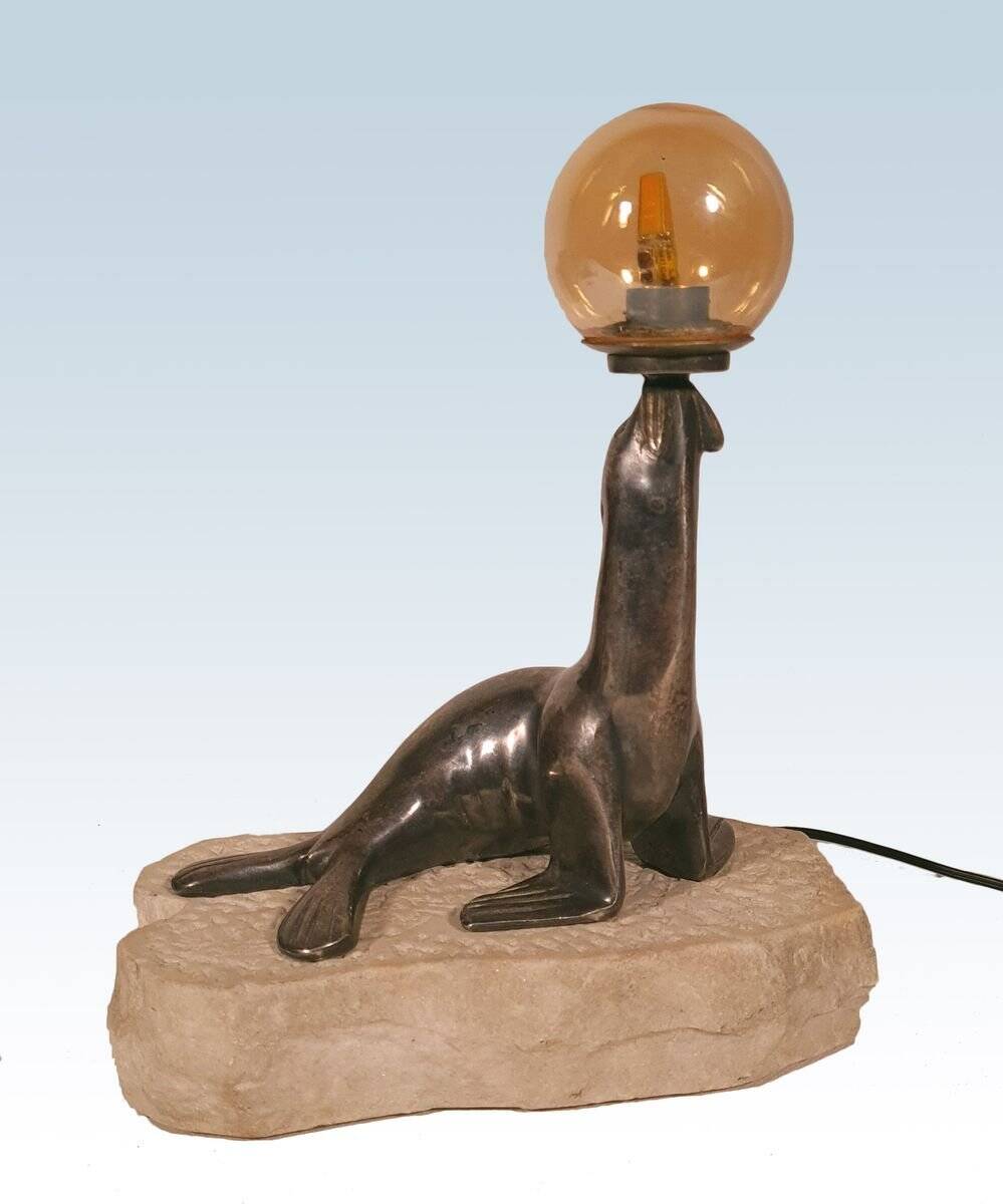 Art Deco "sea lion" lamp in silver-plated bronze