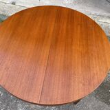 Round teak dining table