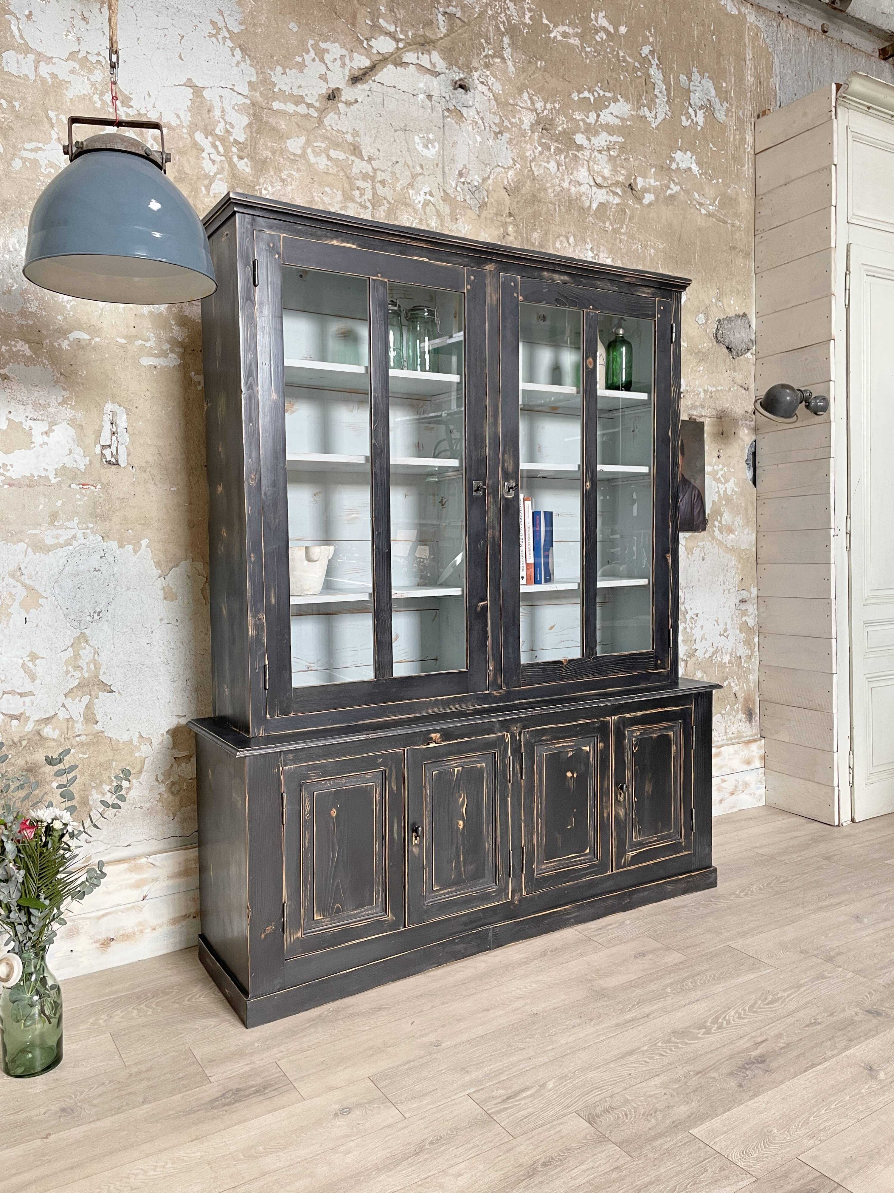 Display cabinet in patinated wood