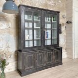 Display cabinet in patinated wood