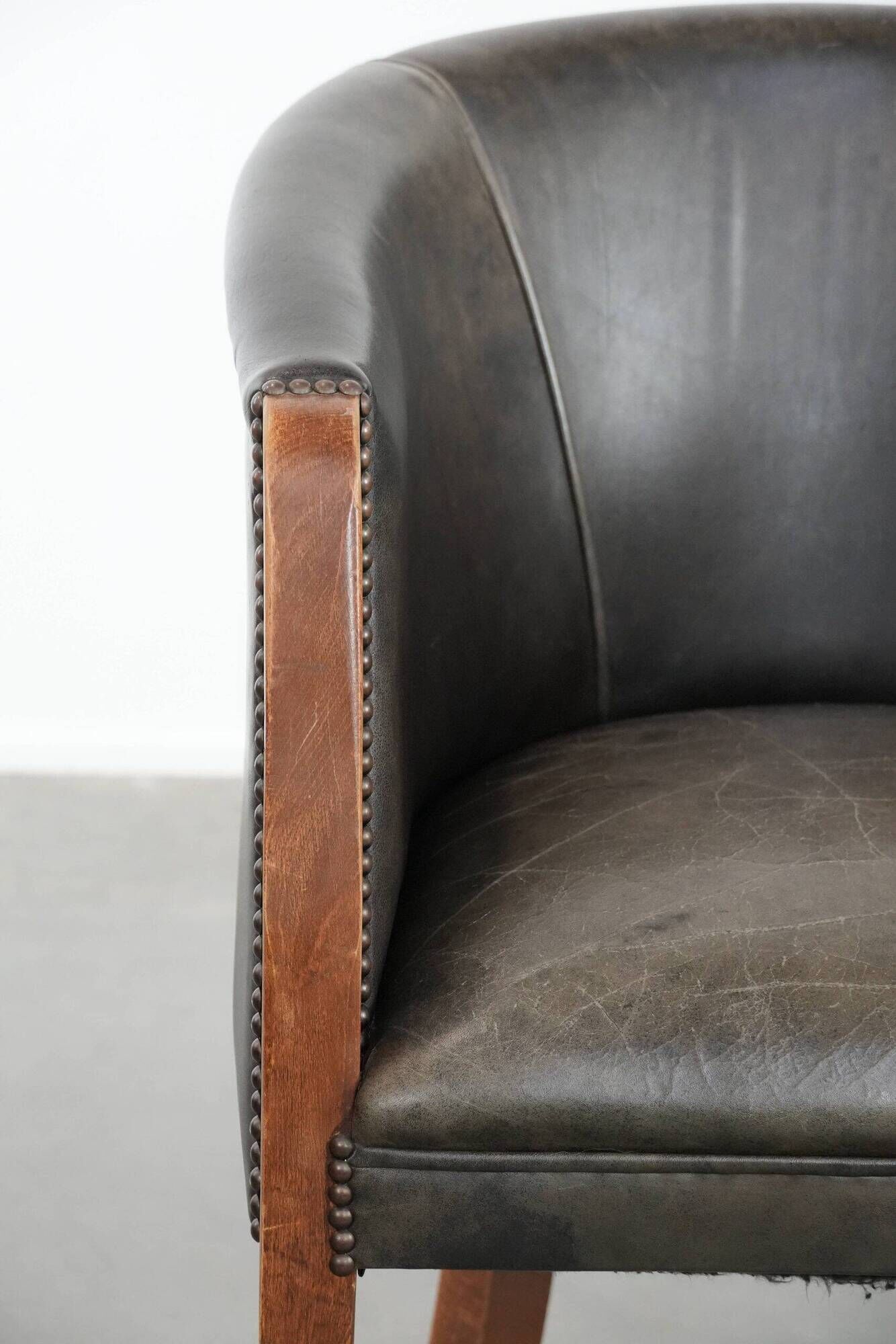 Amazing cow leather and wooden tub chair / side chair