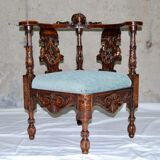 Neo-Renaissance corner armchair in carved walnut