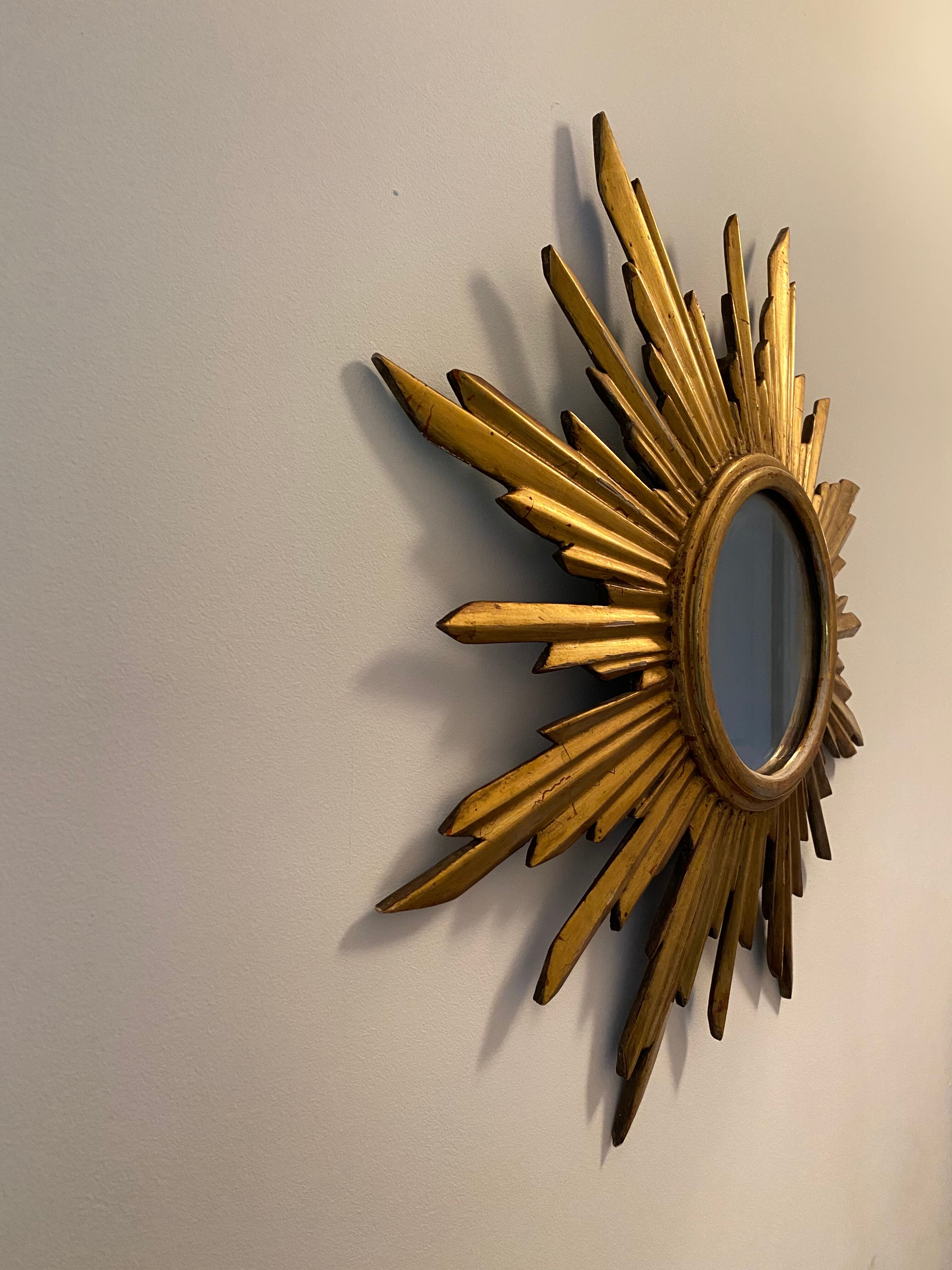 Genuine antique sun mirror