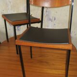 Pair of teak and iron stacking chairs, 1960s