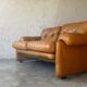 Two seats leather sofa, by Tobias Scarpa