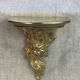 Small wall console in Rococo style in bronze