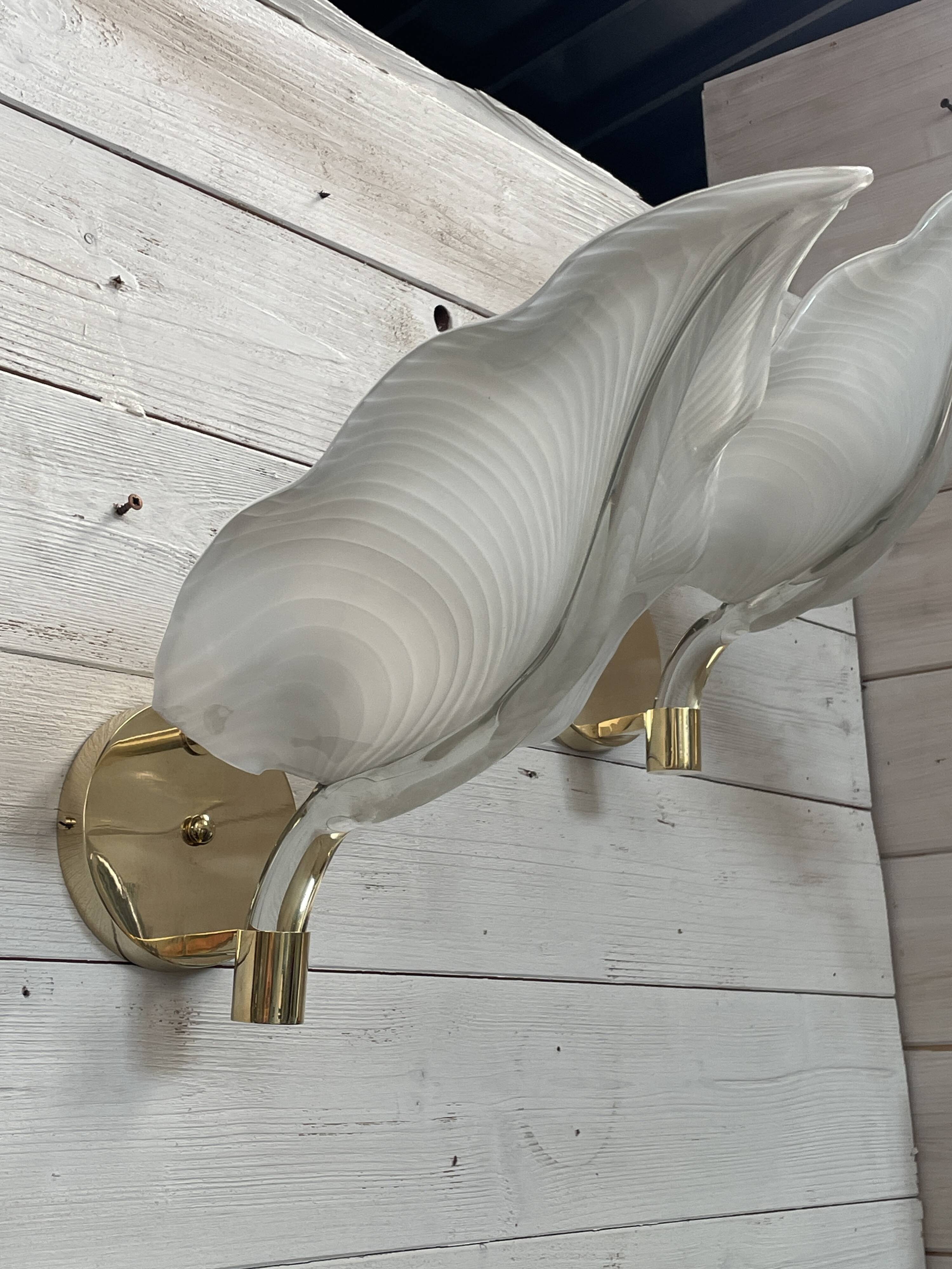 Set of 3 Murano glass wall lamps in white and brass, 1970s.