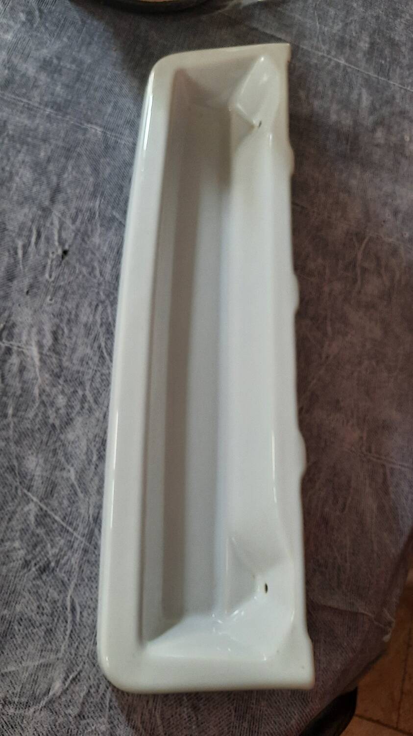 Porcelain bathroom shelf