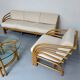 Complete living room with rattan sofa and white bouclette, brass finish, 80's design
