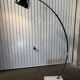 Arc floor lamp design of the 80s