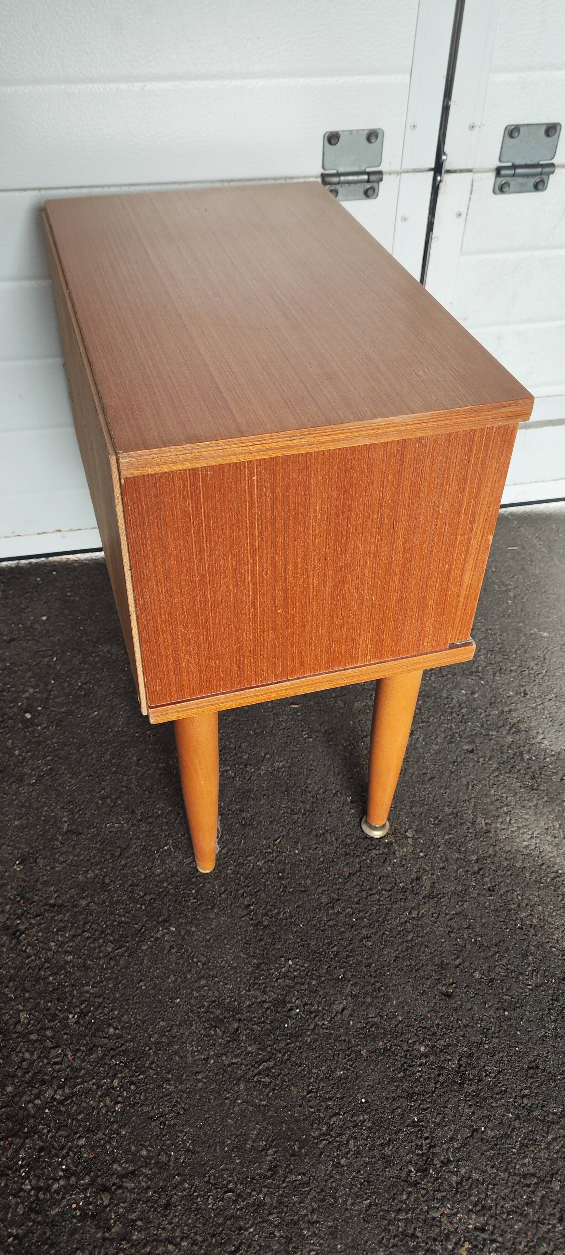 Vintage bedside table from the 70s scandinavian with a flap