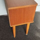 Vintage bedside table from the 70s scandinavian with a flap