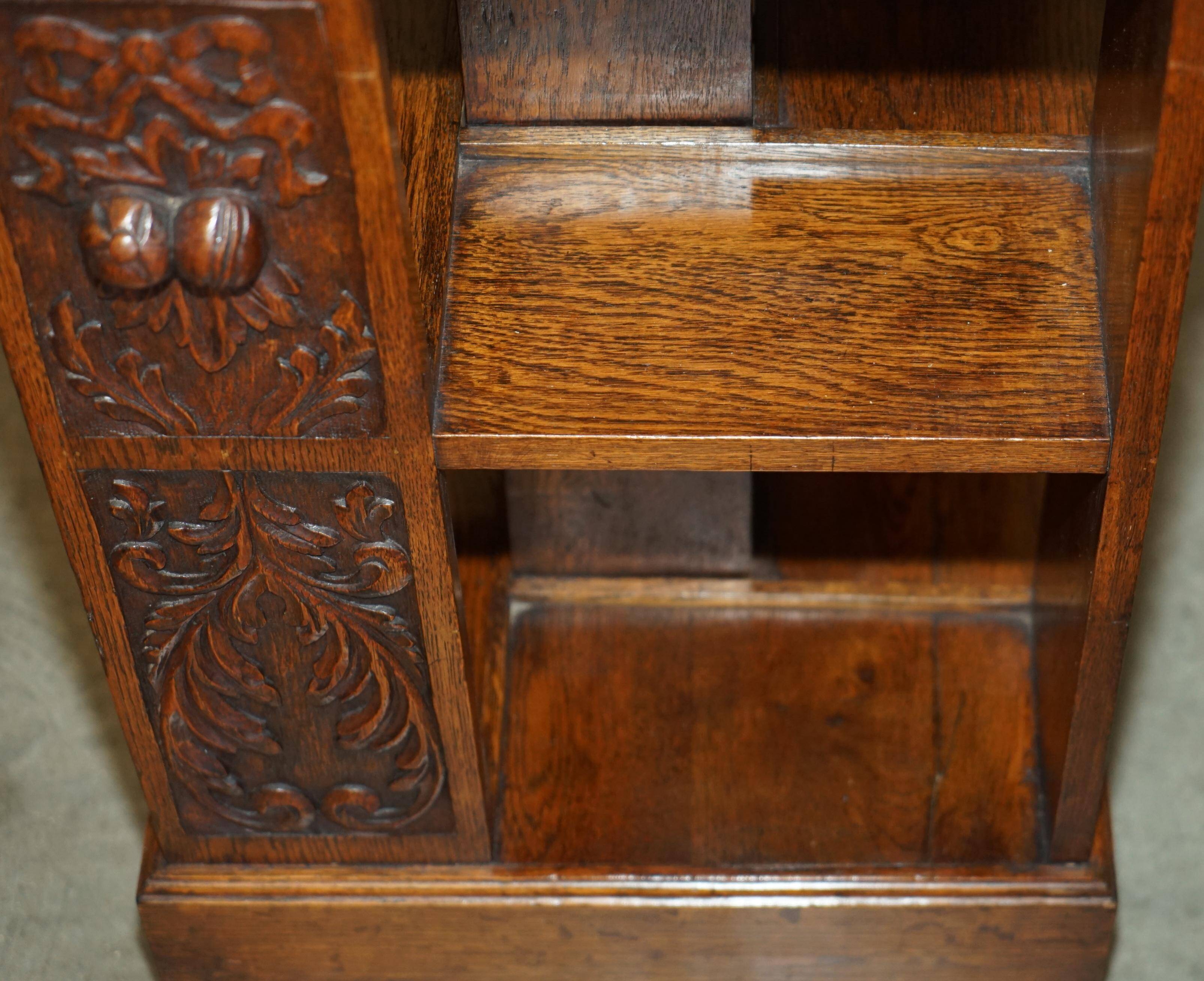 Victorian carved oak revolving library, circa 1880.