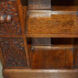 Victorian carved oak revolving library, circa 1880.