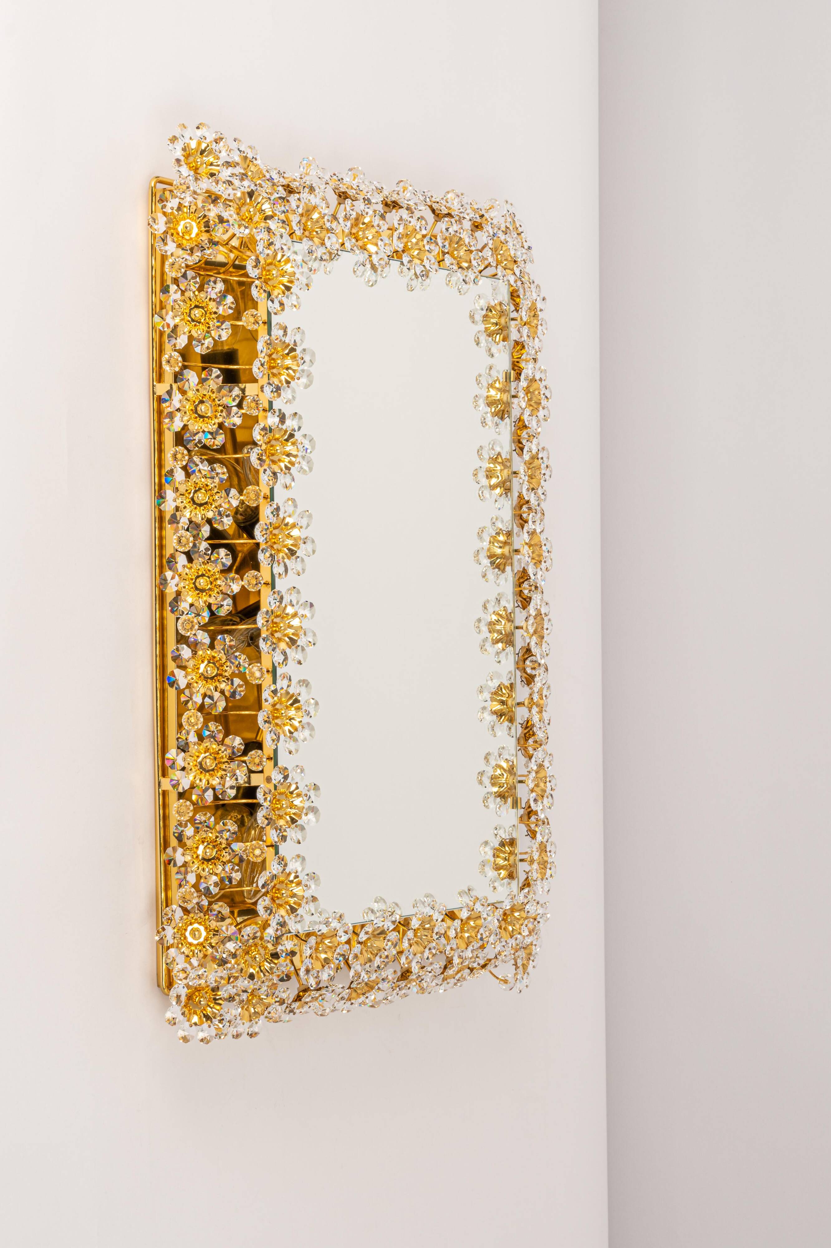 Spectacular backlit mirror in gilded brass and crystal glass by Palwa, Germany.