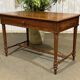 Desk table from the early 20th century in pitch pine.