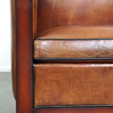 Sheepskin Art Deco design armchair with wood and beautiful cognac-colored leather