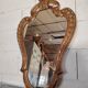 Rococo Style Mirror in Gilded Wood with Sculpted Pediment
