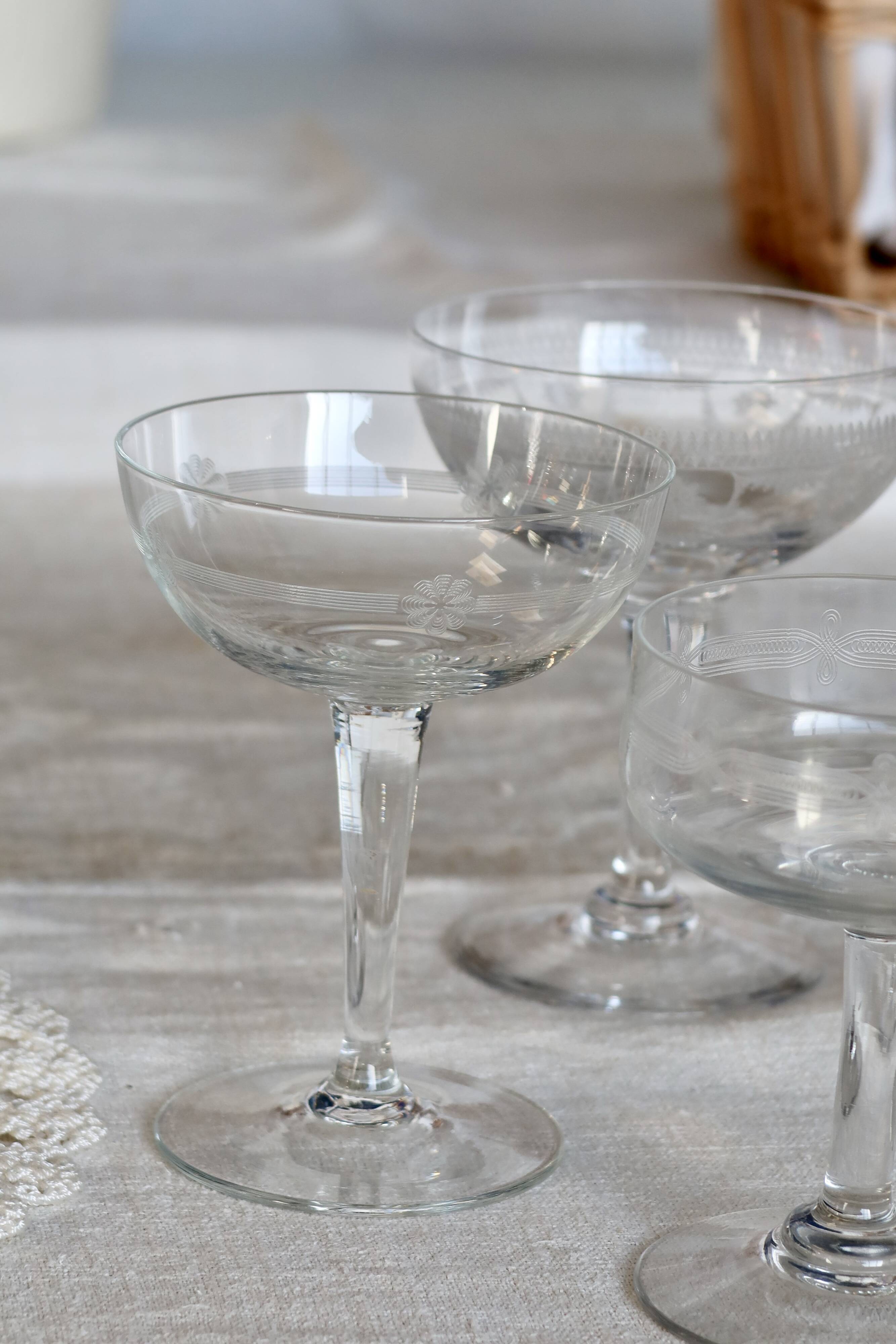 Mismatched vintage cut crystal champagne glasses