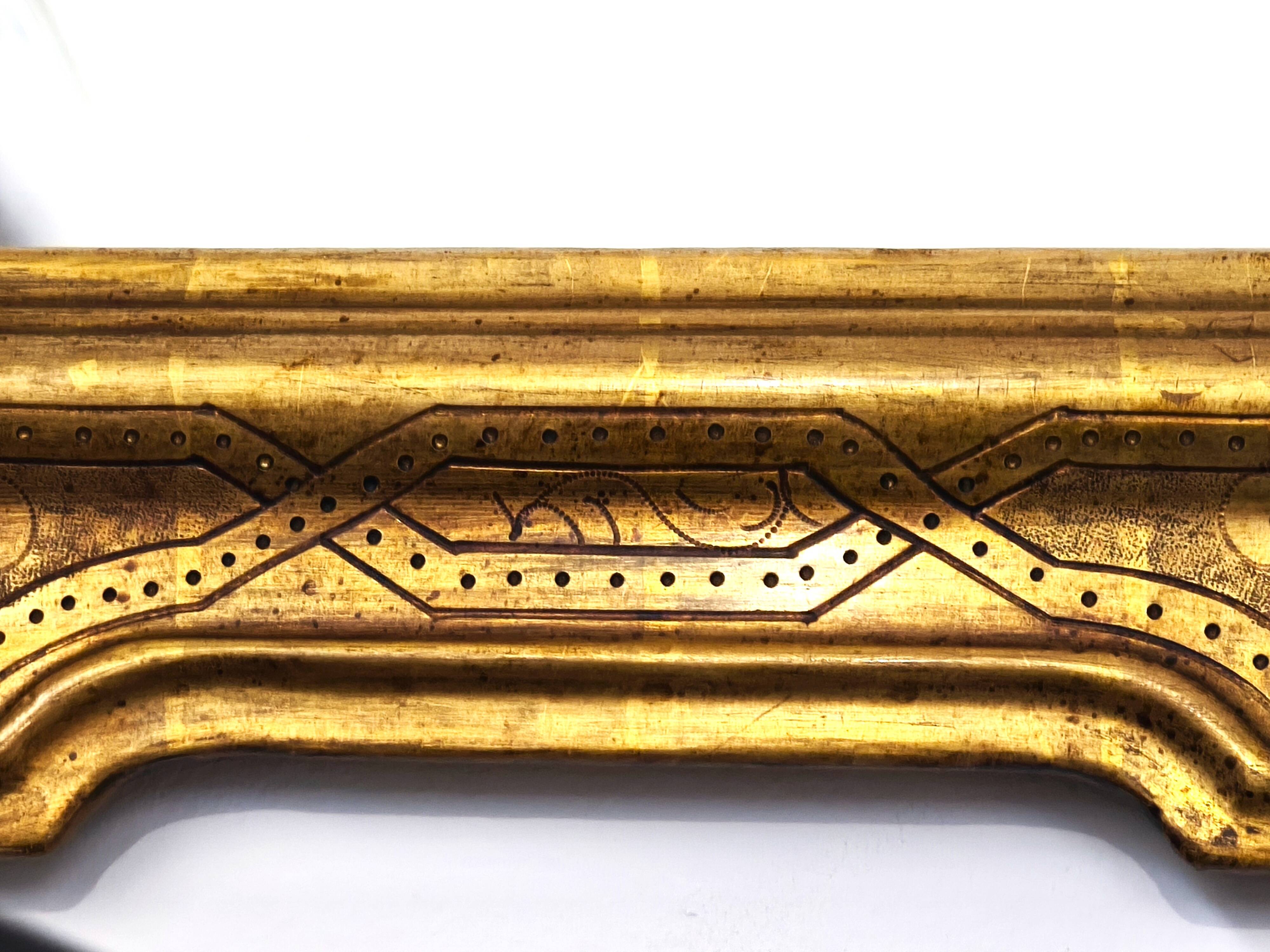 Miroir mural octogonal italien vintage en bois doré, décor bulliné