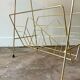 End table, Erdecor magazine holder in gold metal and black glass