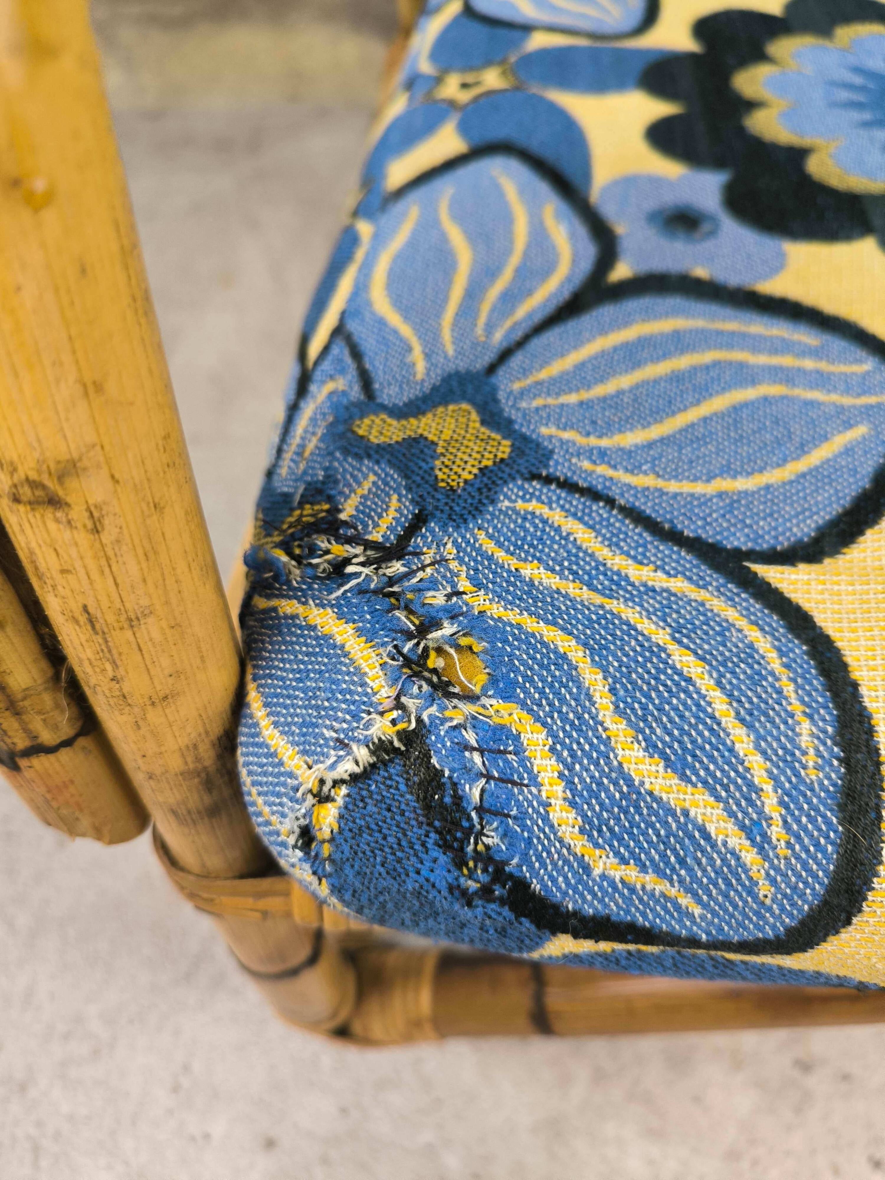 Vintage armchair in rattan and floral fabric