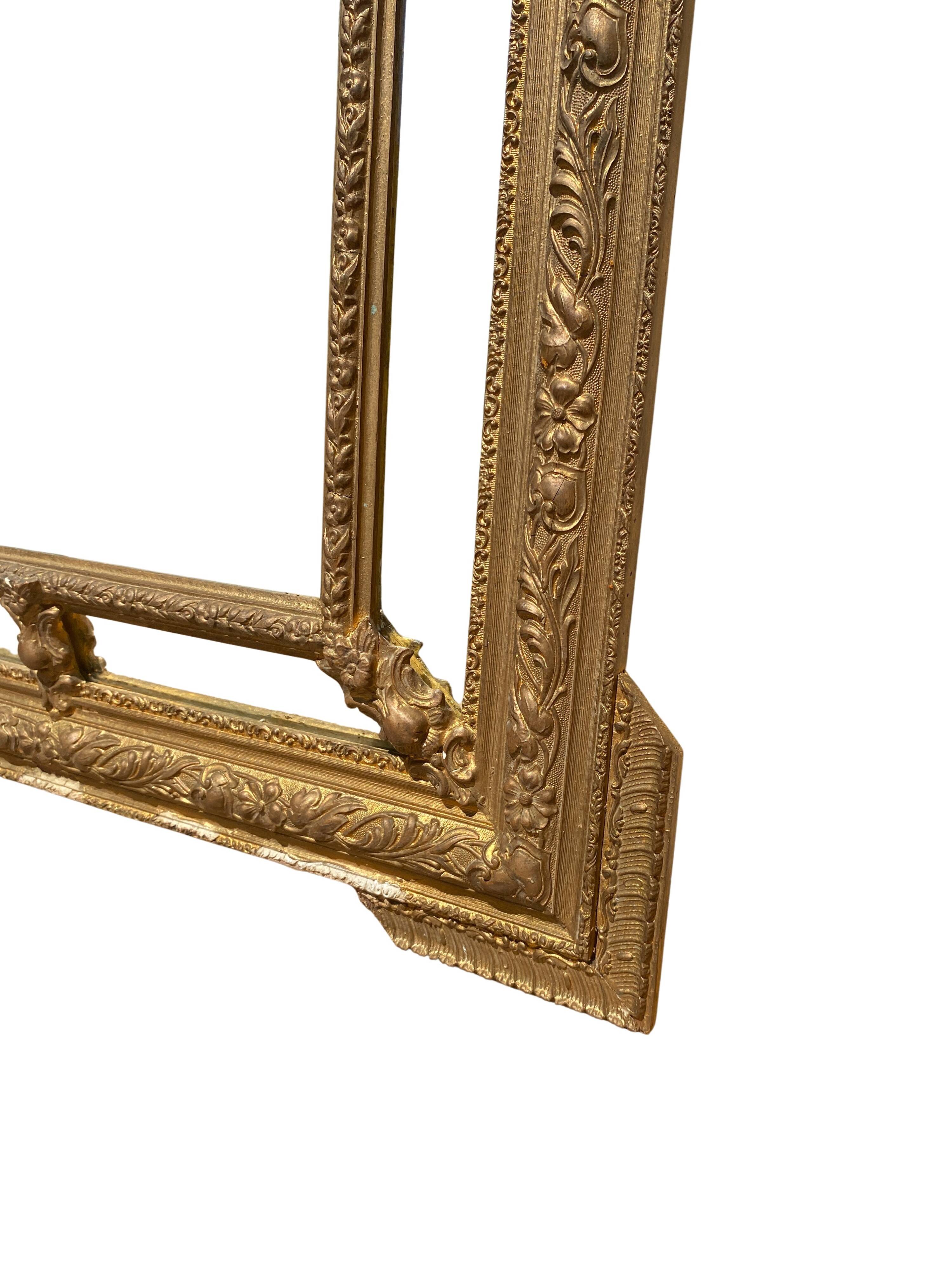 Louis XVI style mirror with glazing beads in gilded wood - 19th century