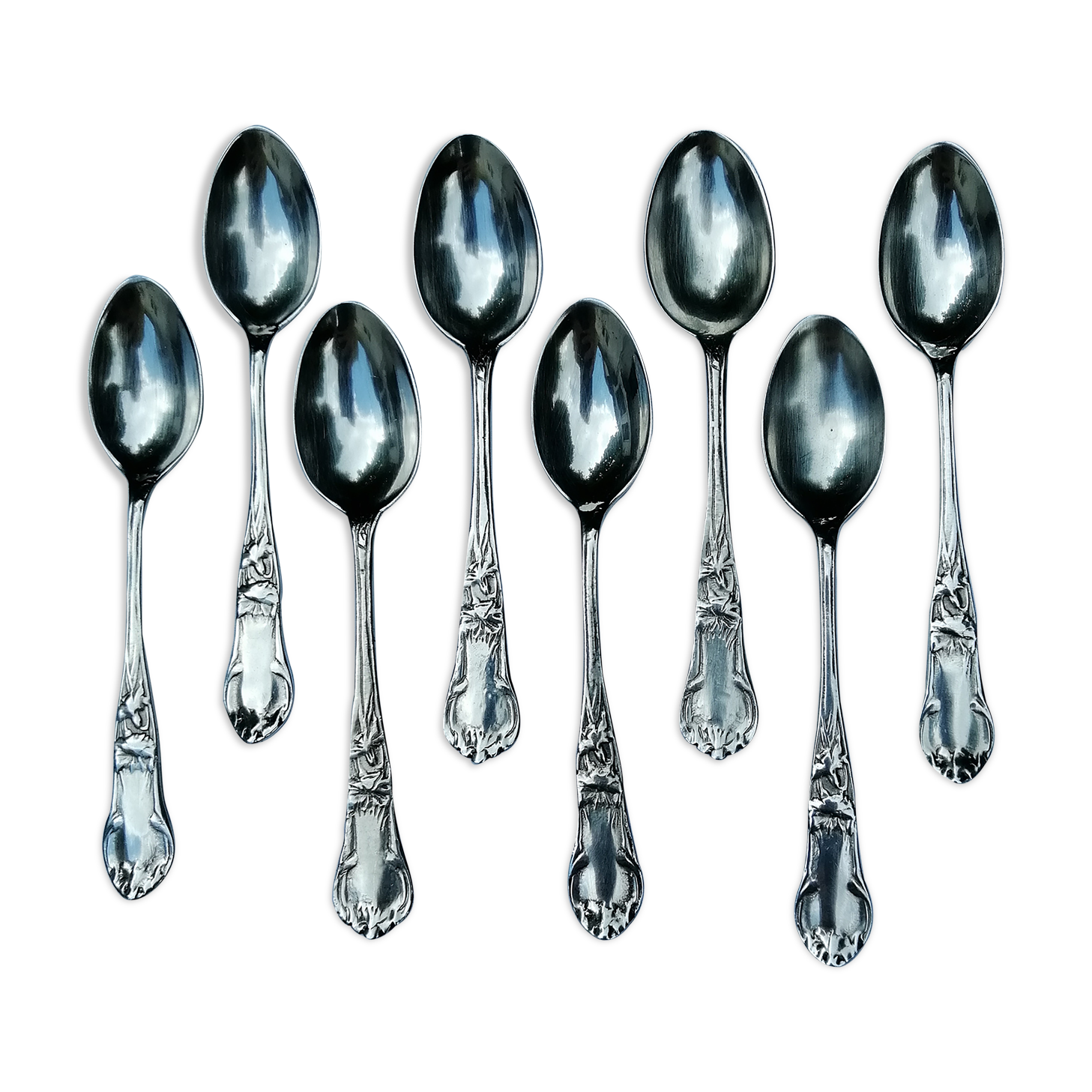 8 small silver spoons