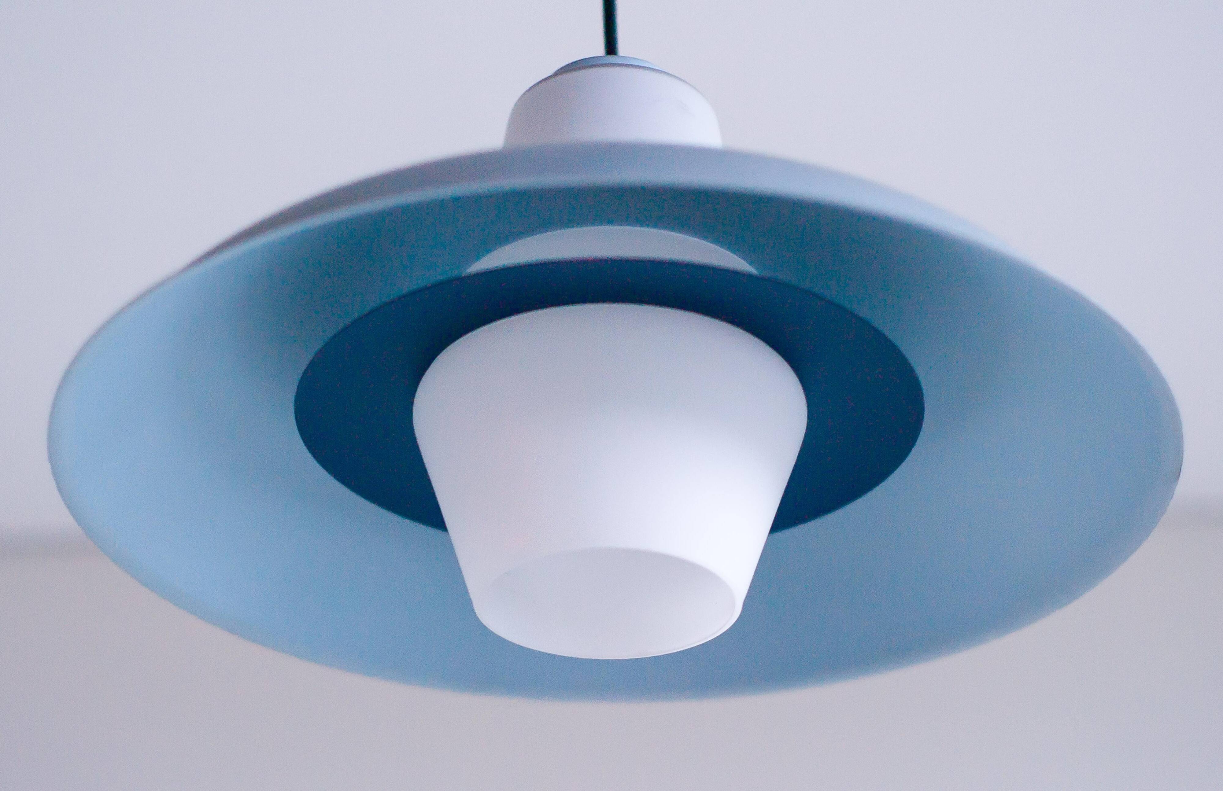 Philips pendant light in frosted sky blue glass by Louis Kalff