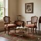 Antique baroque-style armchairs in walnut and fabric, 19th century.