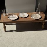 Tray, circular dish or plate made of white striped grey petrified wood.